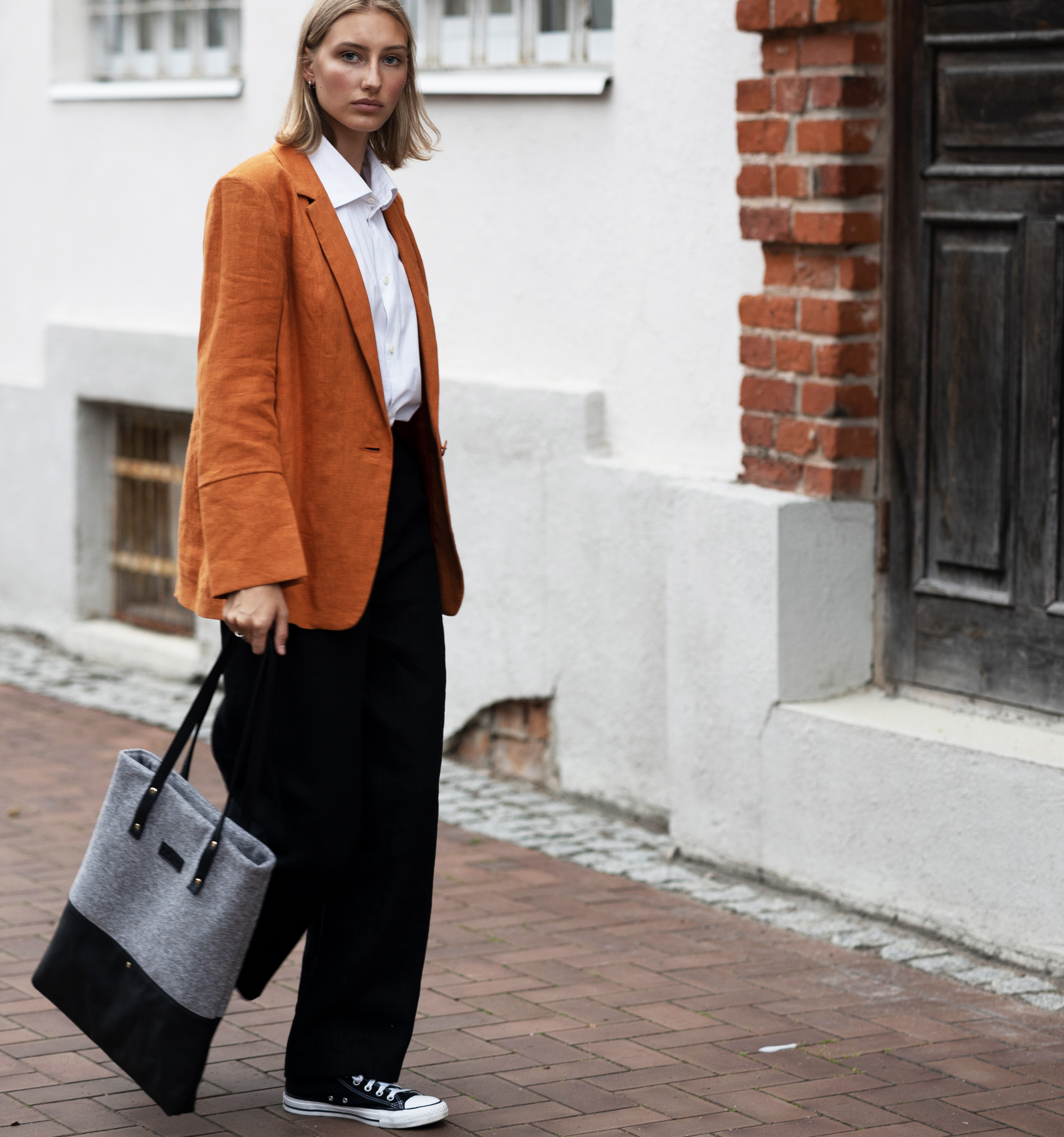 Model with A New Story Black Deluxe Tote Bag