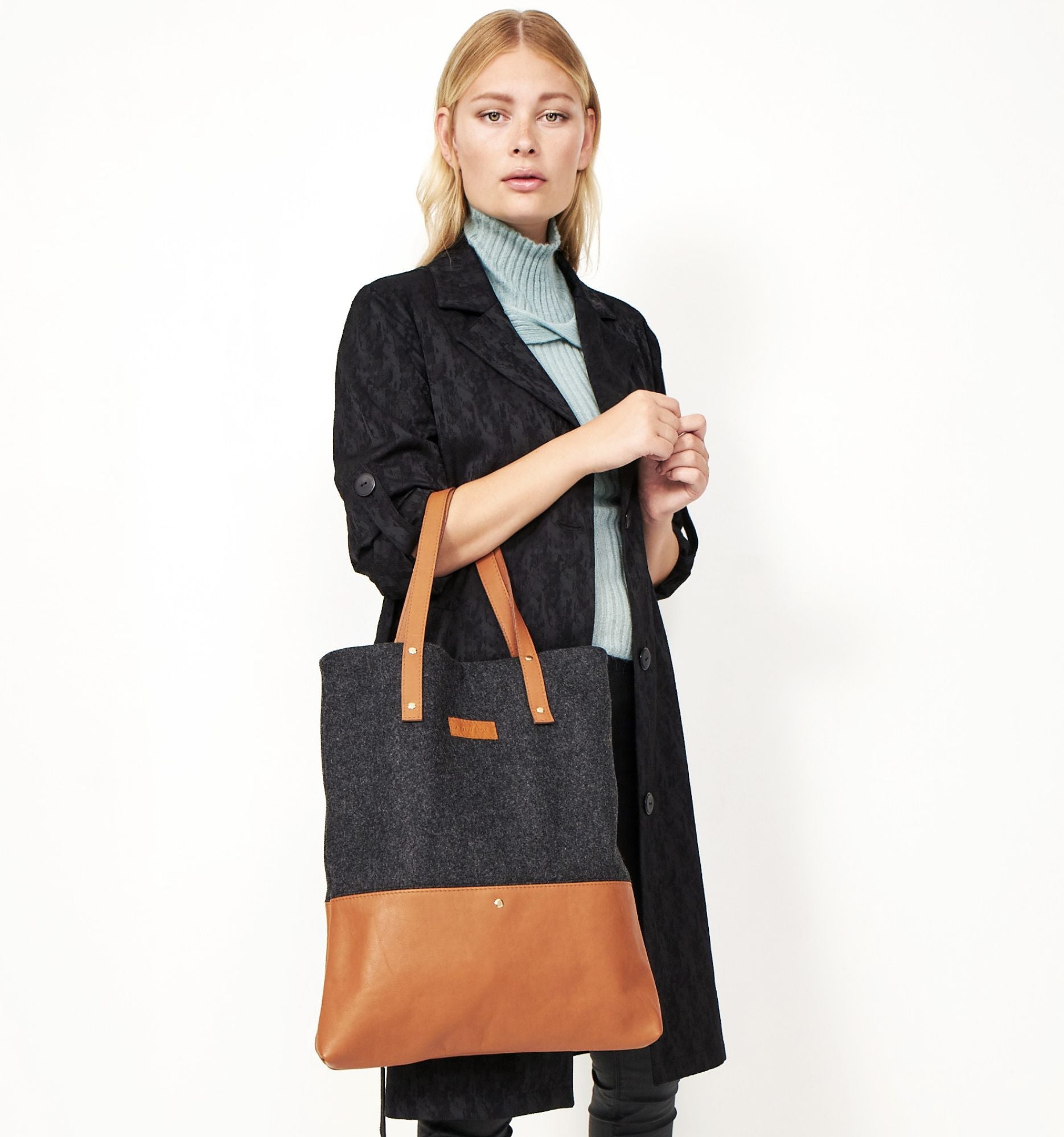 Model with A New Story Brown Deluxe Tote Bag