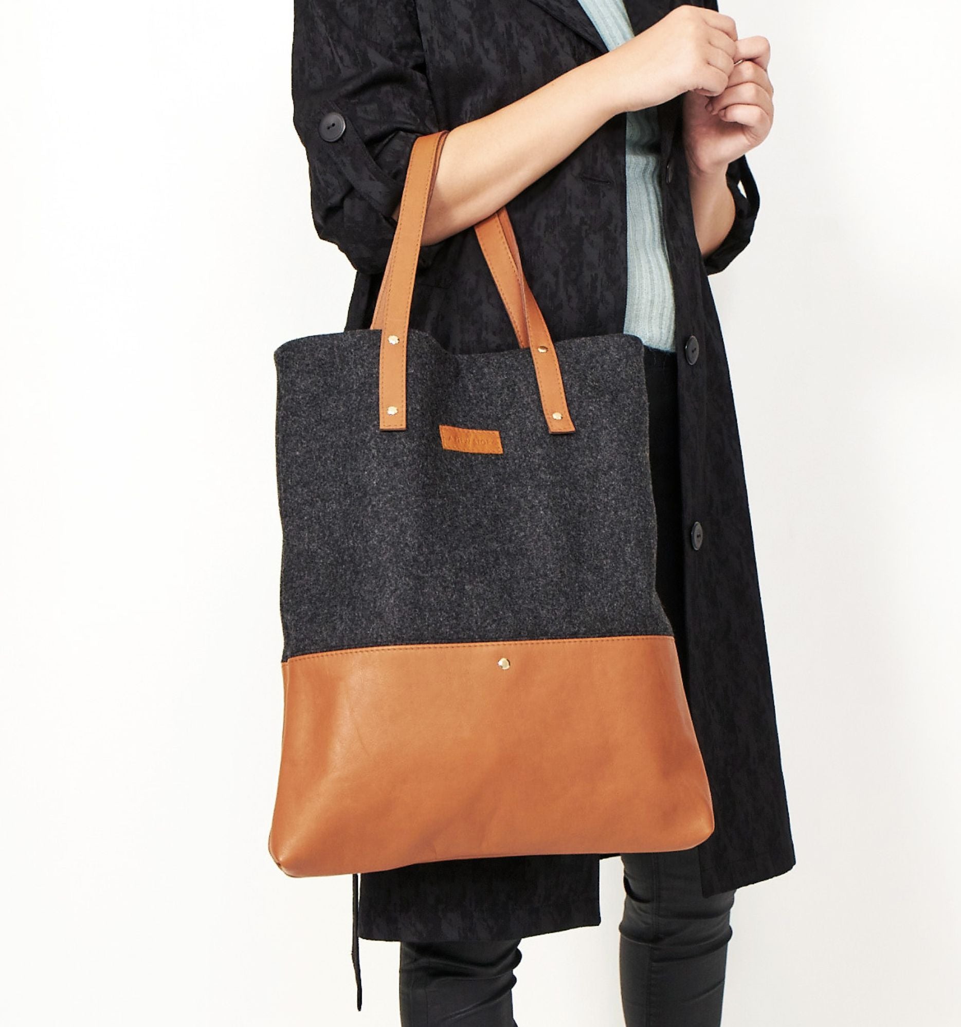 Closeup Model with Brown A New Story Deluxe Tote Bag